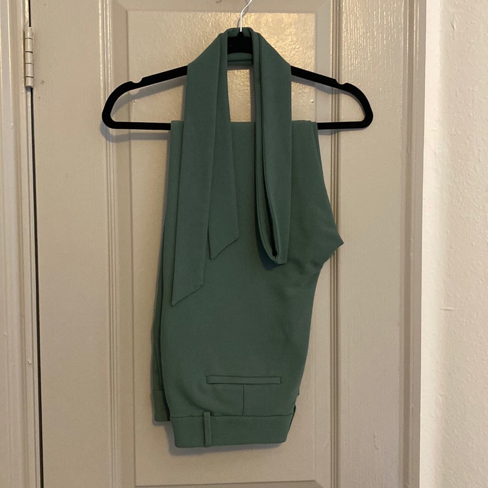 Green trousers with tie belt
